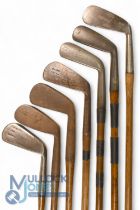 7x Assorted irons to incl Tom Stewart Freddy model for A Beck, Filey, mid iron showing the rifle