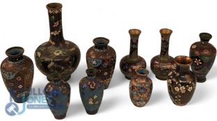 A Collection of Chinese Enamel and Cloisonne vases, in mixed condition - sizes 10cm to 23cm tall,