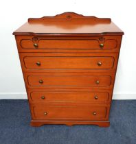 LARGE CHERRY VENEER CHEST OF DRAWERS with a shaped raised back above five graduated drawers with