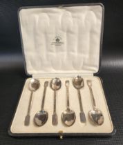 CASED SET OF SIX SILVER TEASPOONS with motif decorated stems, by Mappin & Webb, Sheffield