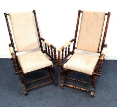 NEAR MATCHING PAIR OF AMERICAN ROCKING CHAIRS with turned decoration, padded backs, seats and