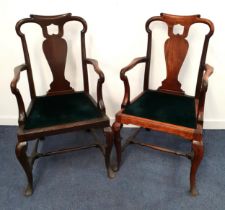 PAIR OF GEORGE II OAK ARMCHAIRS with a shaped and pierced back above a vase splat and shepherd crook