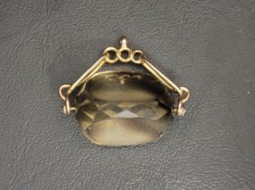 LARGE CITRINE SWIVEL FOB on nine carat gold mount, the gemstone approximately 2.7cm wide, total