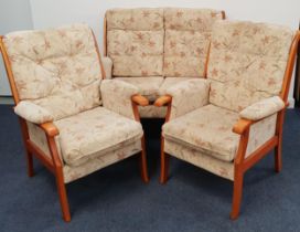 JOHNSON HOLLAND THREE PIECE SUITE comprising a two seat sofa and two armchairs, each with stick
