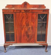 MAHOGANY SIDE CABINET the shaped raised back above a rectangular moulded top with a central panel