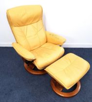 ERKONESS STRESSLESS ARMCHAIR in pale yellow leather with a reclining back and rotating base,