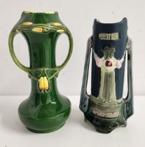 TWO EICHWALD POTTERY VASES each with a green ground and twin handles with tapering bodies, the bases