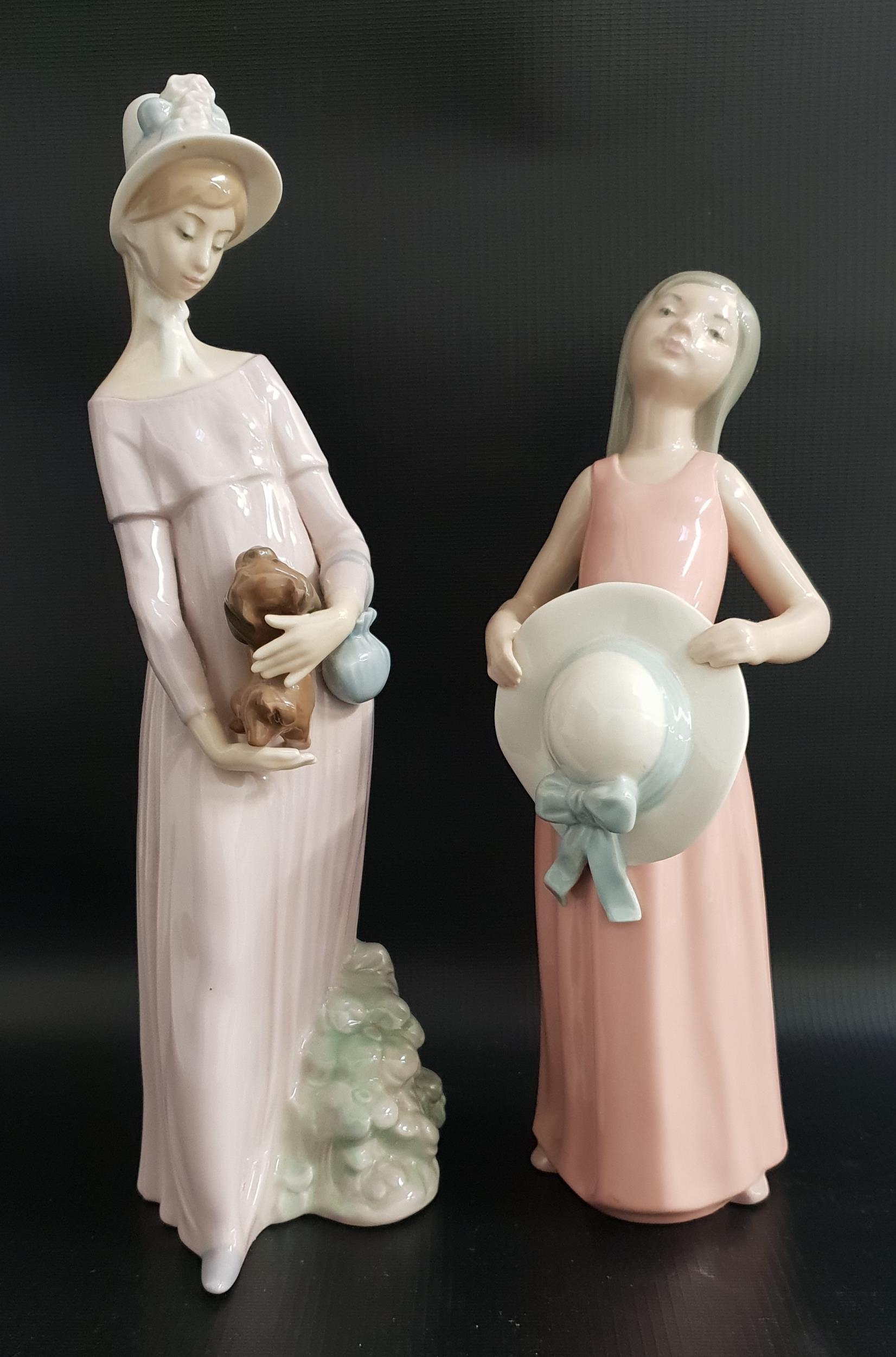 TWO LLADRO FIGURINES comprising The Dreamer, 5008, 25cm high and My Little Pet, 4994, 29.5cm high (