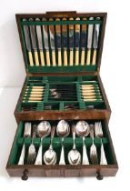 OAK CANTEEN OF CUTLERY for twelve place settings, comprising entrée knives and forks, soup and