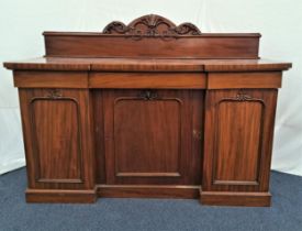 19th CENTURY MAHOGANY INVERTED BREAKFRONT SIDEBOARD with a carved raised back above three frieze