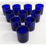 TEN BRISTOL BLUE GLASS LINERS of cylindrical form, 3.7cm high (10)