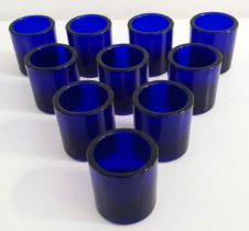 TEN BRISTOL BLUE GLASS LINERS of cylindrical form, 3.7cm high (10)