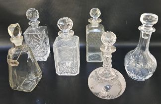 SIX CUT AND PRESSED GLASS DECANTERS AND STOPPERS one with a 'Brandy' decanter label (6)