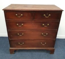 GEORGE III MAHOGANY CHEST OF DRAWERS with a moulded top above two short and three long cockbeaded