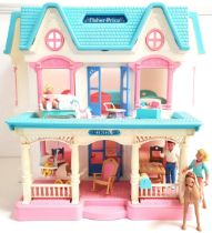 FISHER PRICE DOLLS HOUSE with a fold down veranda with a child's swing and mail box, the back of the