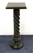 GREEN VEINED MARBLE TORCHERE with a square top on a barley twist column and a hexagonal base,