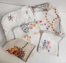 SELECTION OF VINTAGE NAPERY including an embroidered tea cosy, table runner and six various table