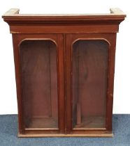 VICTORIAN MAHOGANY UPPER BOOKCASE SECTION with a pair of arched glazed doors, standing on a plinth