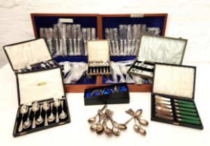 LARGE SELECTION OF SILVER PLATED FLATWARE including three part canteens, tea and coffee spoons,