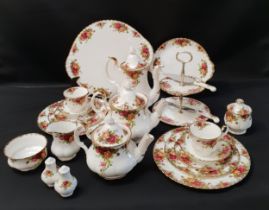 ROYAL ALBERT OLD COUNTRY ROSES DINNER SERVICE comprising four butter dishes, six entrée plates,