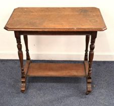 EDWARDIAN OAK SIDE TABLE with a rectangular moulded top with canted corners, standing on turned