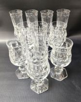 SELECTION OF CRYSTAL GLASSES all with hexagonal bases, comprising eleven champagne flutes, six red