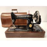 VINTAGE SINGER SEWING MACHINE in a wooden case, numbered Y8436564