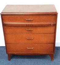 1950s OAK LAMINATED CHEST OF DRAWERS the moulded top above four long drawers, standing on shaped