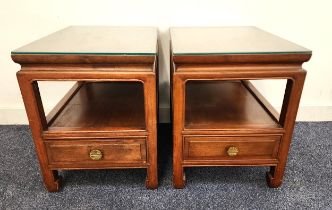 PAIR OF CHINESE HARDWOOD SIDE TABLES with rectangular tops above an open shelf with a drawer