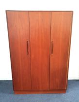 G PLAN TEAK WARDROBE with a pair of sliding fold back doors and a single door opening to reveal a