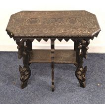 CARVED INDIAN TEAK SIDE TABLE the shaped top decorated with a central elephant within a floral