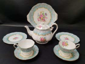 ROYAL ALBERT ENCHANTMENT TEA SERVICE comprising six cups and saucers, six side plates, sandwich