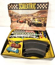 VINTAGE 1950s SCALEXTRIC SET in original box with two cars, track, barriers and hand controls