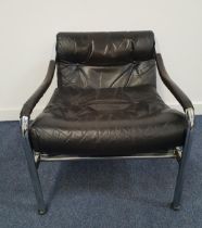 TIM BATES FOR PIEFF ARMCHAIR with a chrome tubular frame and a black leather button back and seat