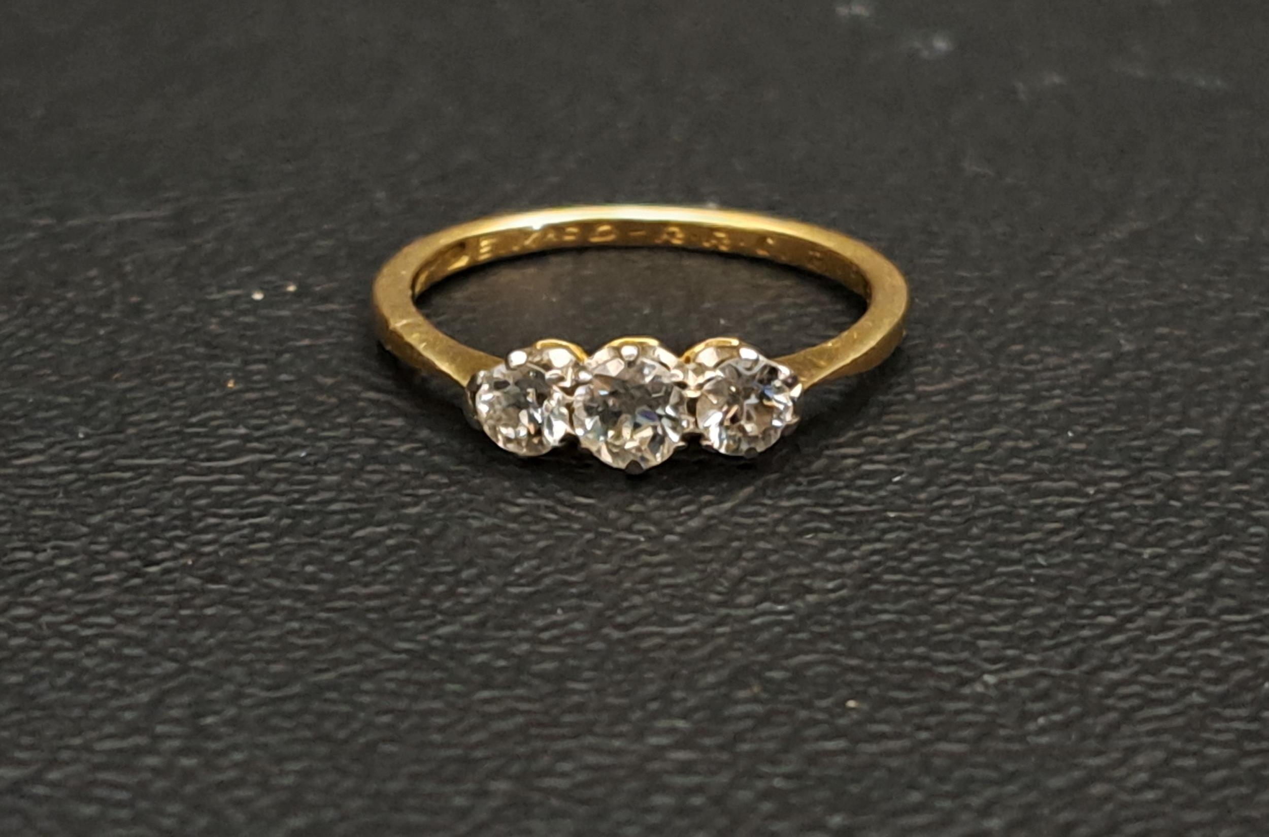 GRADUATED DIAMOND THREE STONE RING the diamonds totalling approximately 0.5cts, on eighteen carat