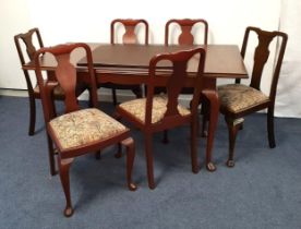 MAHOGANY RECTANGULAR DINING TABLE AND CHAIRS the table with a pull apart top and an extra leaf,