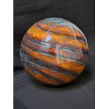 DECORATIVE GLASS SPHERE with orange, yellow, blue and purple swirls, 24cm high