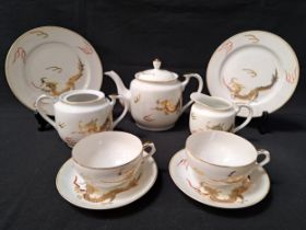 JAPANESE EXPORT WARE TEA SET comprising six cups and saucers, six side plates, lidded tea pot,