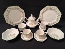 JOHNSON BROTHERS DINNER SERVICE the white ground decorated with a floral border with green