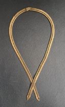 NINE CARAT GOLD NECKLACE the two herringbone effect strands joined by articulated rivet detail to