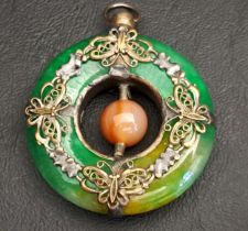 UNUSUAL CHINESE JADE PENDANT the green jade ring with white metal butterfly decoration and a central