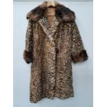 LADIES VINTAGE LEOPARD FUR COAT with a coney fur collar and cuffs, an internal pocket and one button