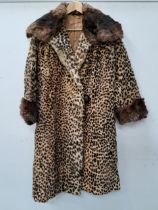 LADIES VINTAGE LEOPARD FUR COAT with a coney fur collar and cuffs, an internal pocket and one button