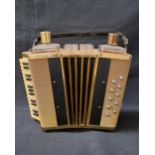 NOVELTY MUSICAL ACCORDIAN DECANTER SET with two decanters and four shot glasses, with a fold over