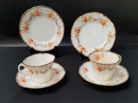 ROYAL ALBERT TEA SERVICE decorated with poppies and gilt highlights, comprising eight cups and