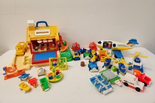LARGE SELECTION OF FISHER PRICE PLAY FAMILY TOYS including a School House, School bus, play