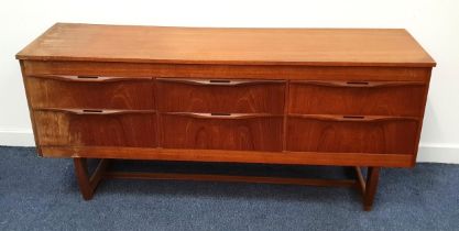 VINTAGE SAKOL TEAK SIDEBOARD with a rectangular top above three pairs of drawers with roll over