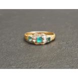 VICTORIAN EMERALD AND DIAMOND RING the central emerald approximately 0.15cts, in unmarked high carat