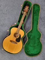 TAKAMINE SIX STRING ELECTRO ACCOUSTIC GUITAR model no. EG-230, G series with a natural coloured