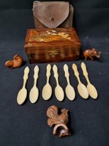MIXED LOT OF COLLECTABLES comprising an Indian teak inlaid box, seven shaped bone spoons, carved